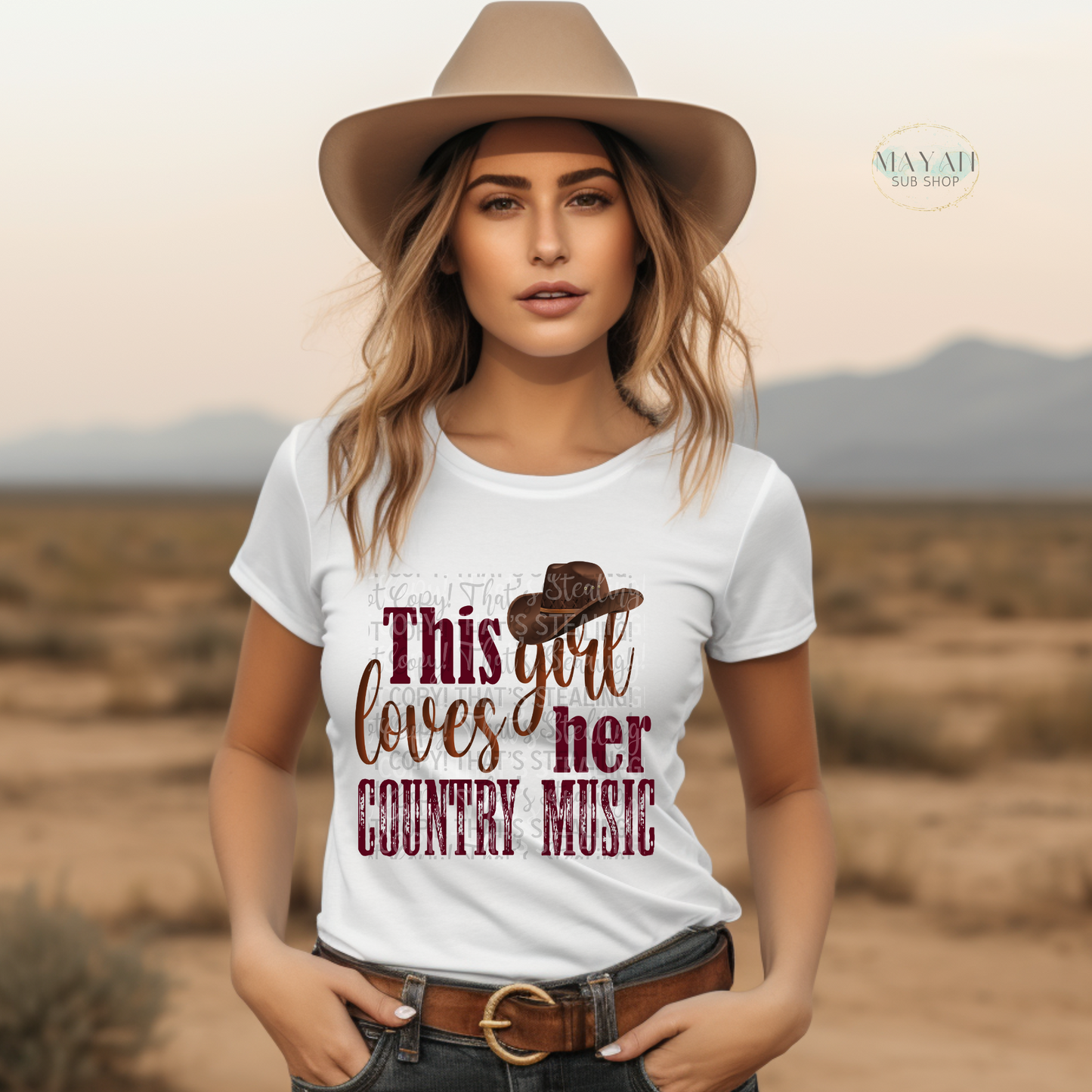 This girl loves her country music shirt. -Mayan Sub Shop