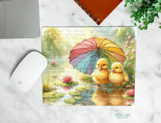 Ducks umbrella mouse pad. -Mayan Sub Shop
