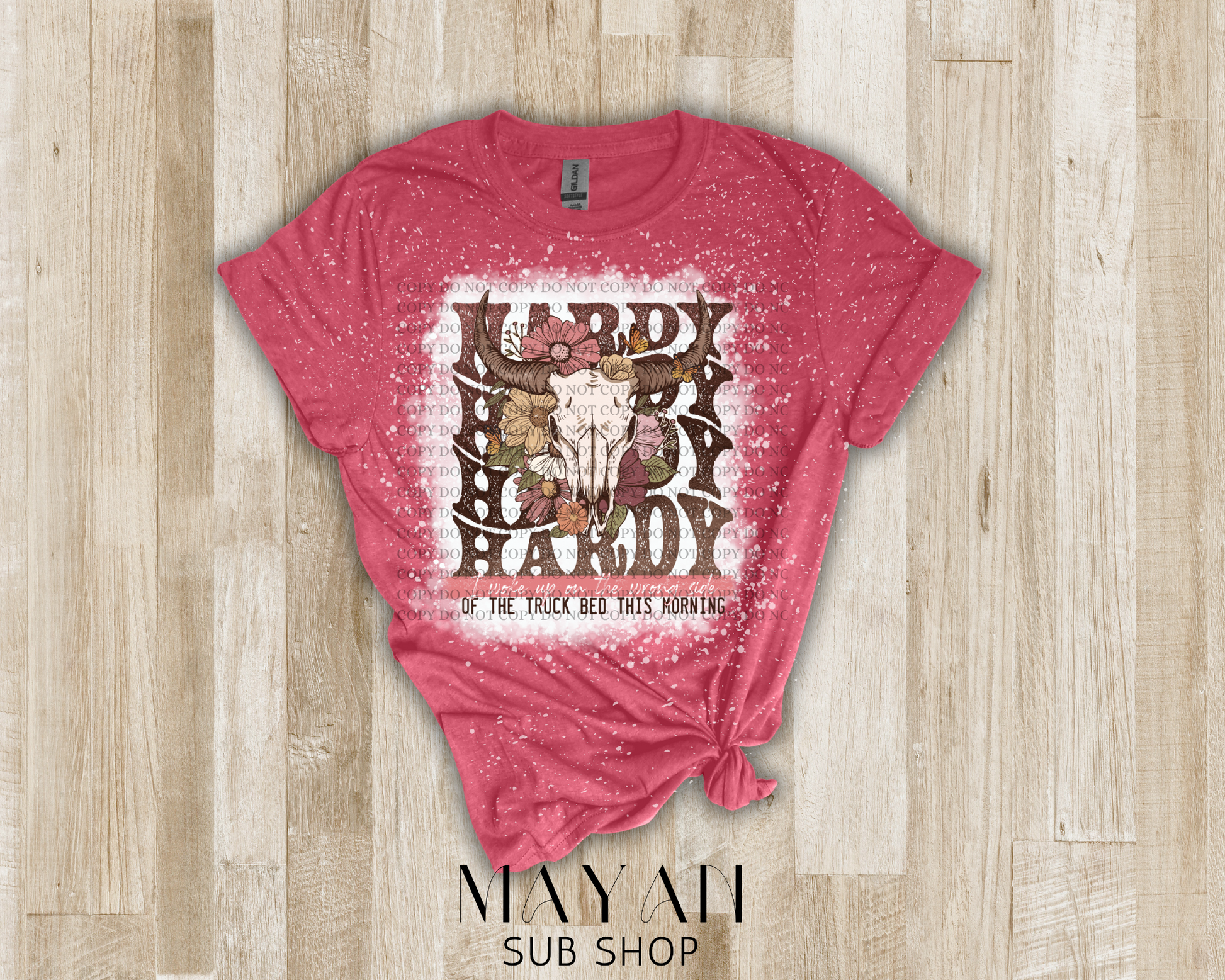 country song shirt with cattle head and flowers in a heather cardinal shirt