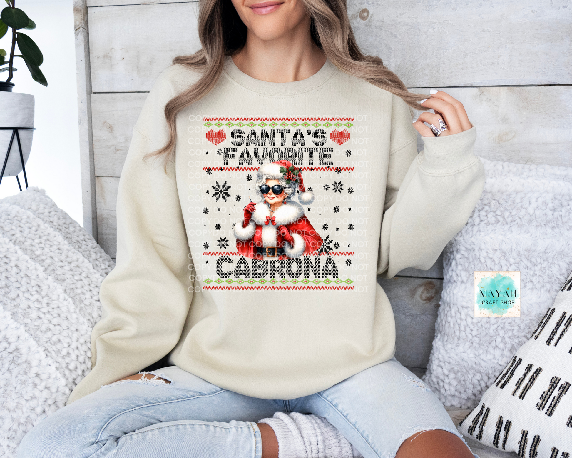 Santa's favorite cabrona sand sweatshirt. -Mayan Craft Shop