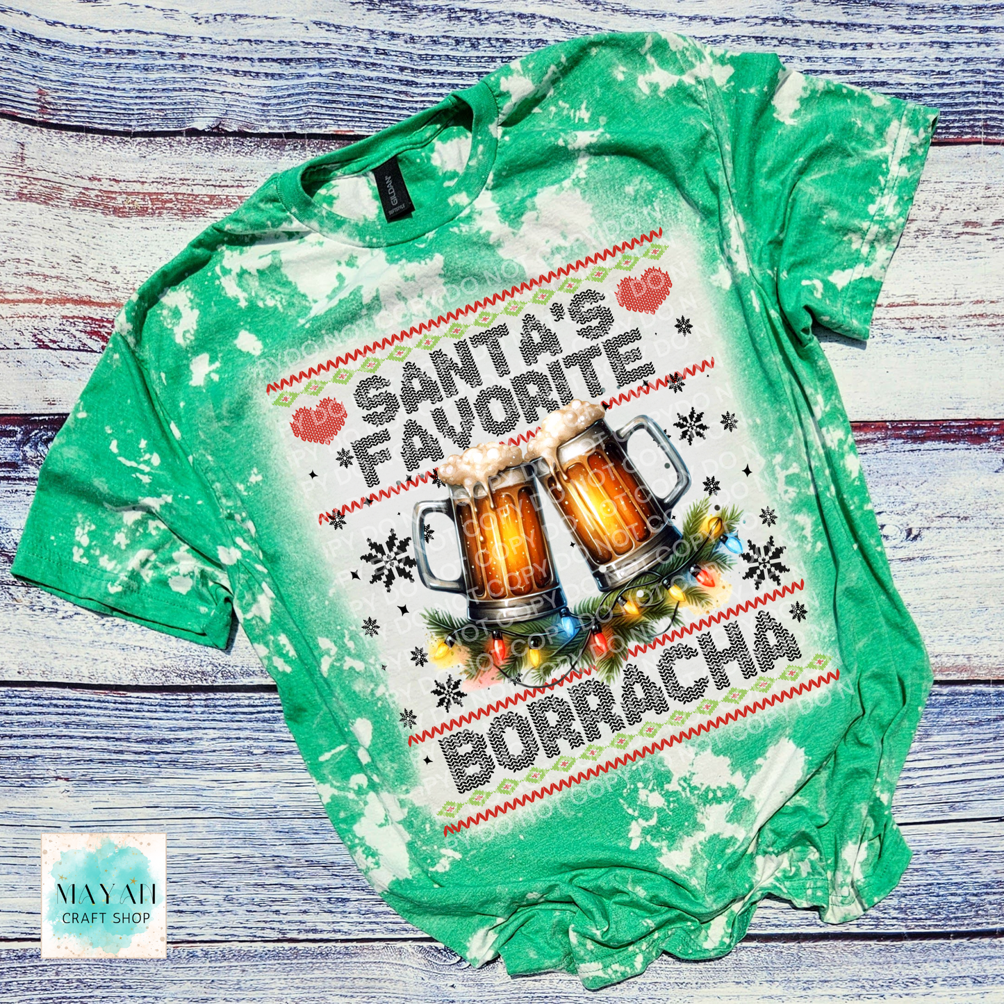 Santa's favorite borracha heather irish green bleached tee. -Mayan Craft Shop