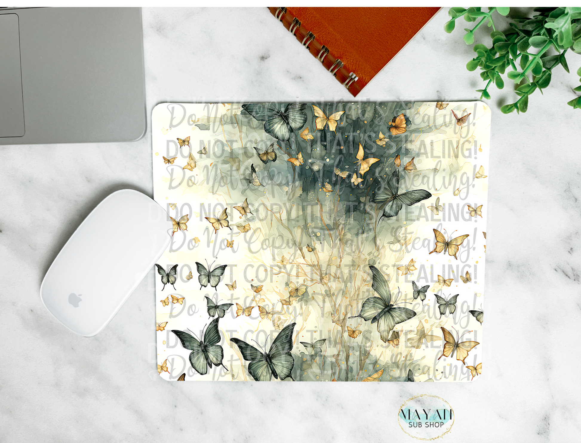 Hunter green butterflies mouse pad. -Mayan Sub Shop