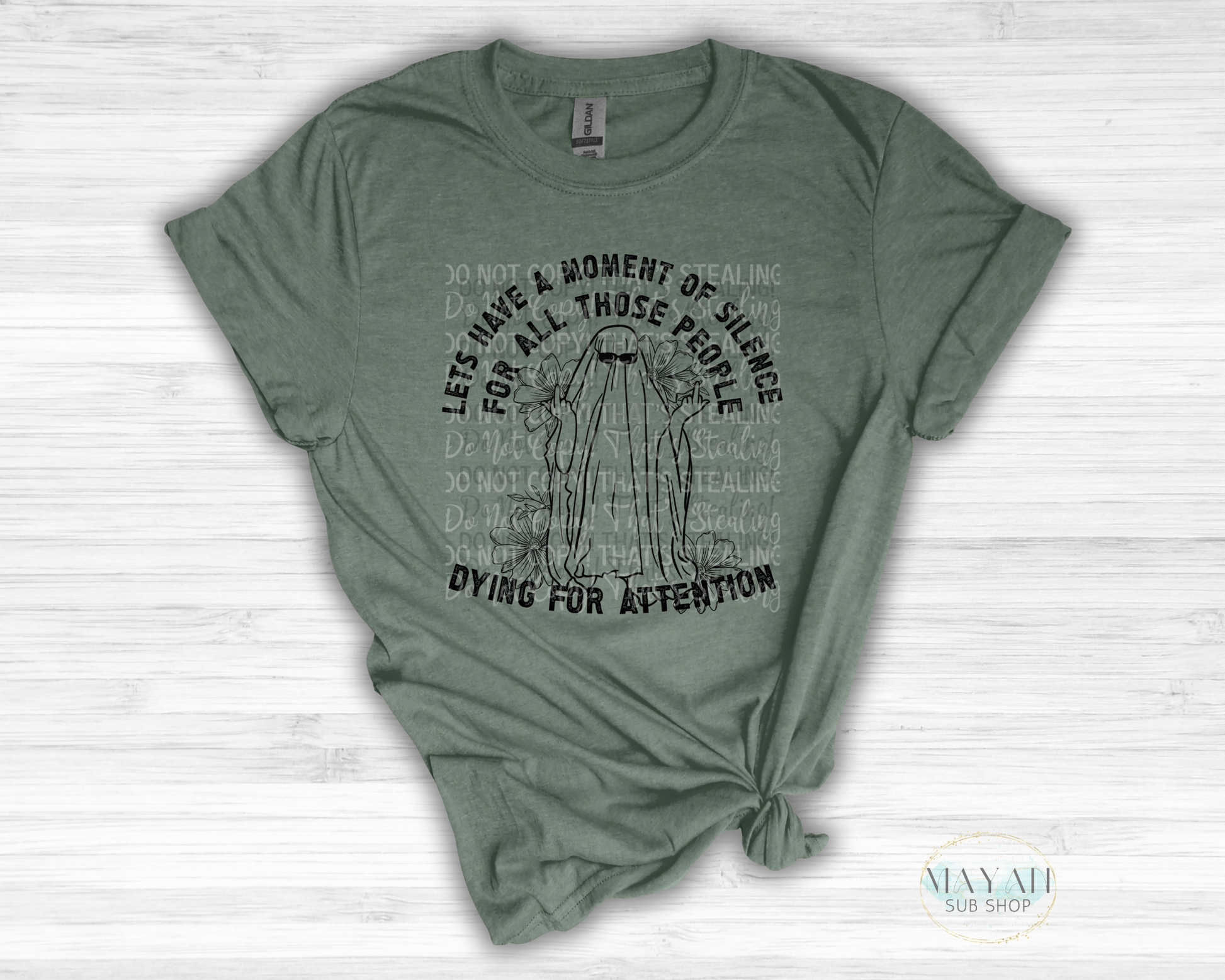 Dying for attention in heather military green shirt. -Mayan Sub Shop
