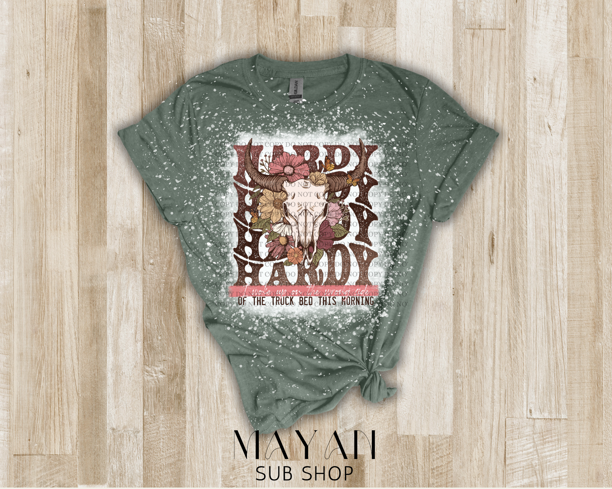 country song shirt with a cattle head and flowers in a heather military green shirt