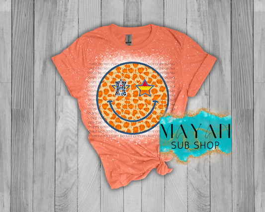 Astros smiles in heather orange bleached shirt. -Mayan Sub Shop