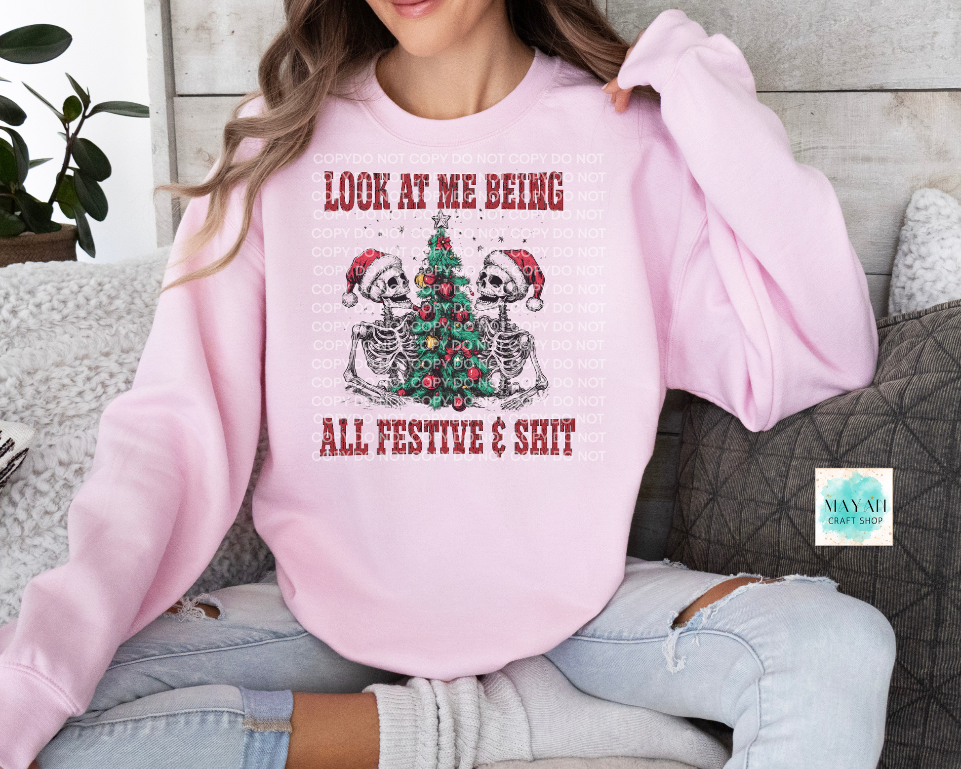 Being festive pink sweatshirt. -Mayan Craft Shop