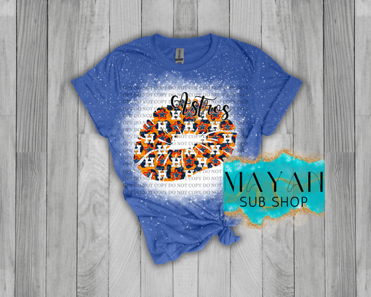 Astros kisses in heather royal blue bleached shirt. -Mayan Sub Shop