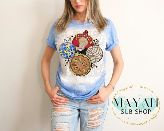 Mexican ornaments in heather royal blue bleached shirt. -Mayan Sub Shop