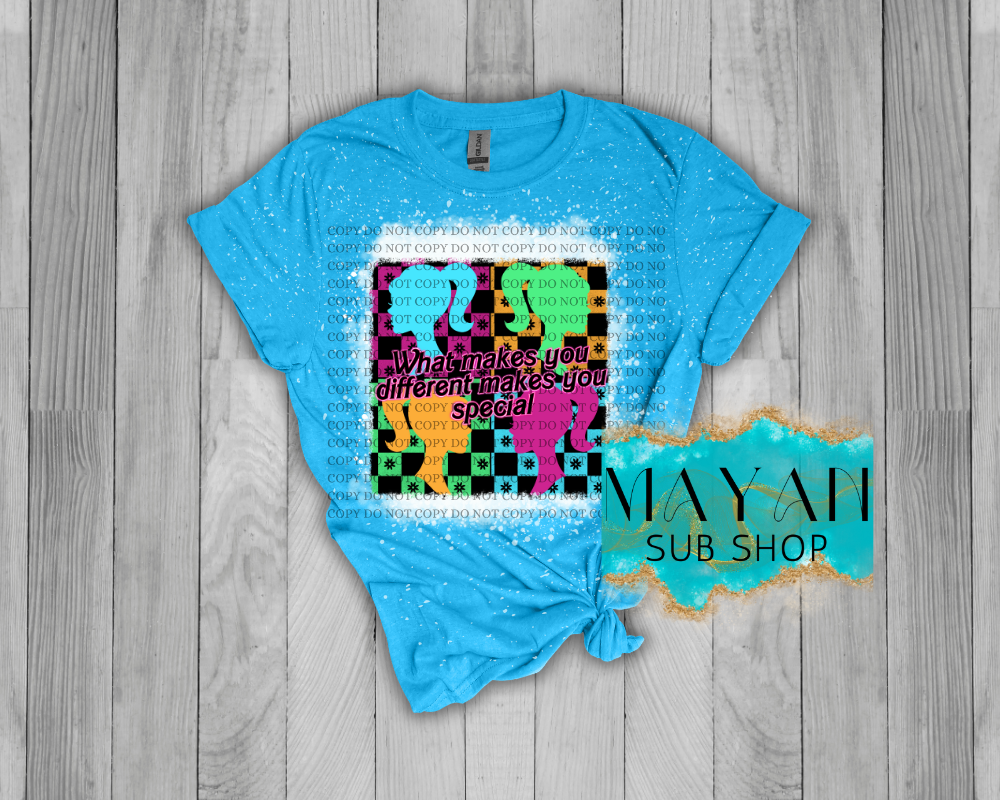 Makes you special in heather sapphire bleached shirt.- Mayan Sub Shop